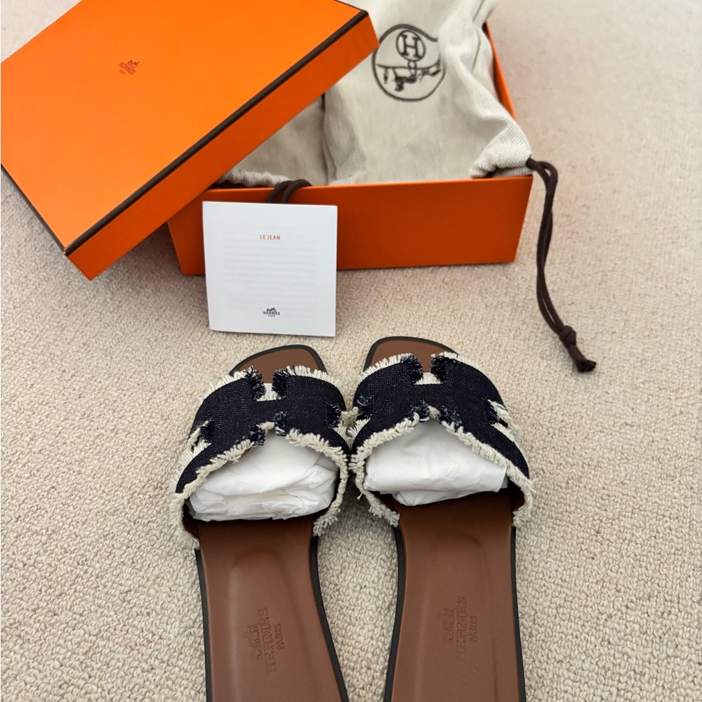 Hermes Black and Cream Oran Sandals